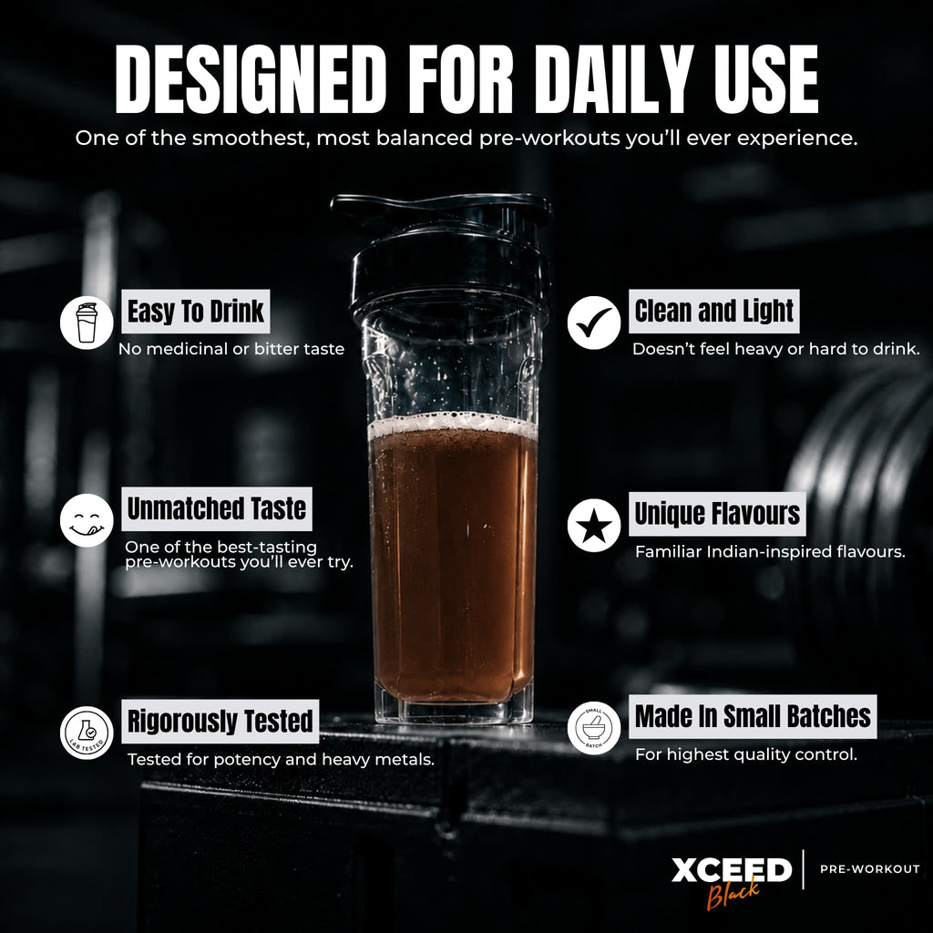 A pre-workout drink in a clear glass with a black lid, shown on a dark gym background with marketing text around it. The text reads 'DESIGNED FOR DAILY USE' and lists features like 'Easy To Drink,' 'Clean and Light,' 'Unmatched Taste,' 'Unique Flavours,' 'Rigorous Tested,' and 'Made in Small Batches.